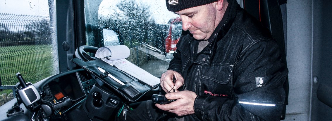 truck driver with hand held device